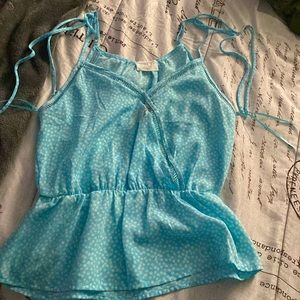 This is an XS shirt that fits like a M